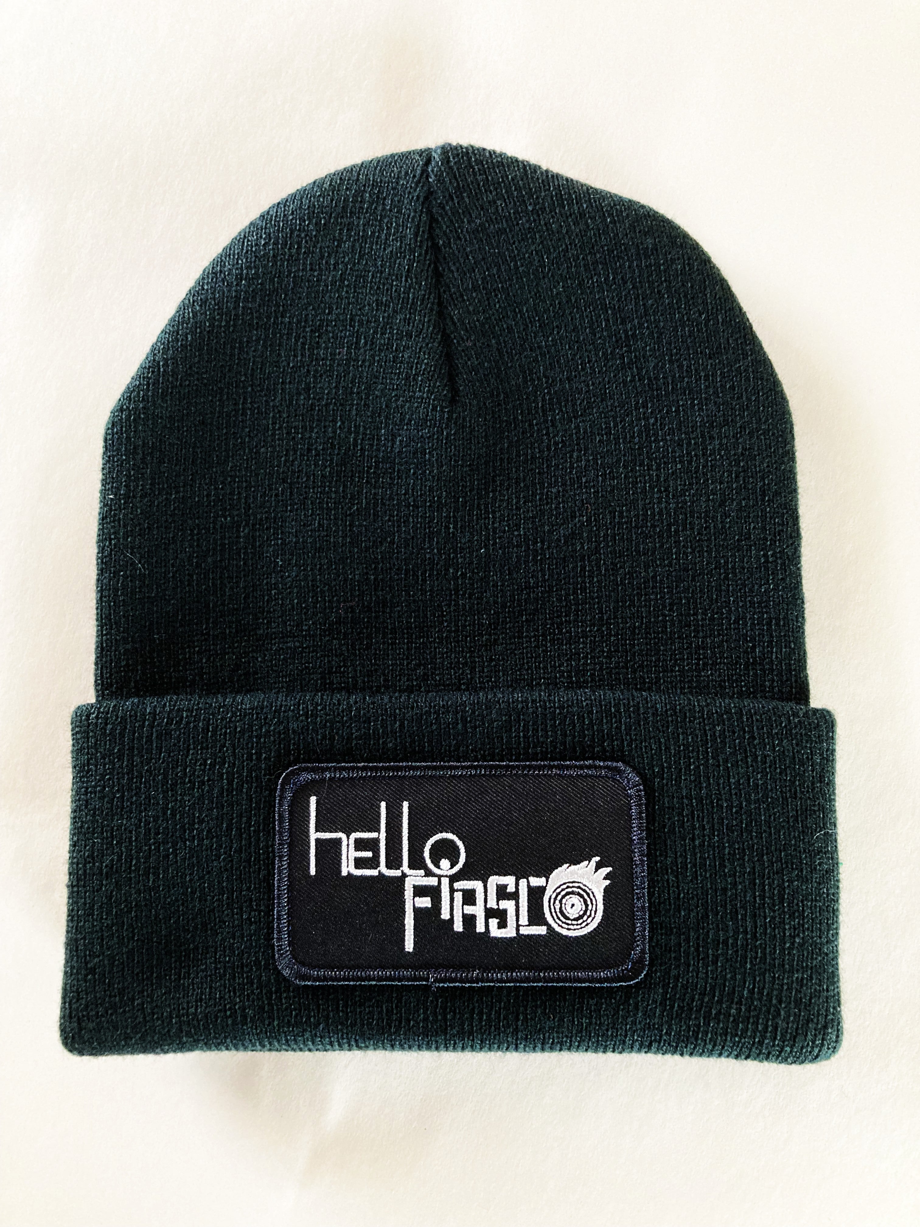 UNISEX BLACK TOQUE (WINTER HAT / BEANIE) WITH BAND LOGO. Also get in RED, BLUE or BLACK.